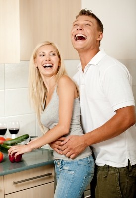 young couple cooking